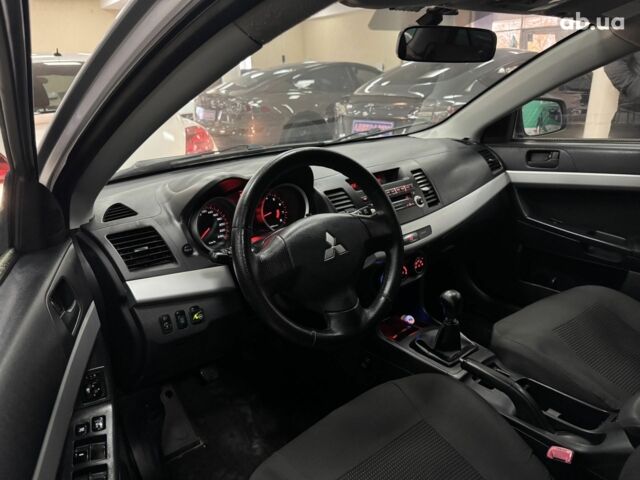 Серый Мицубиси Лансер, объемом двигателя 0 л и пробегом 241 тыс. км за 6400 $, фото 8 на Automoto.ua