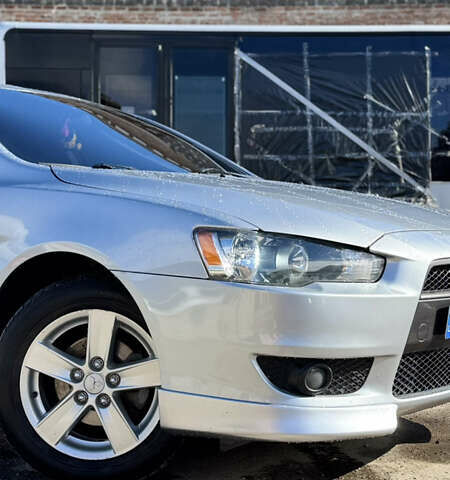 Серый Мицубиси Лансер, объемом двигателя 2 л и пробегом 190 тыс. км за 6900 $, фото 2 на Automoto.ua