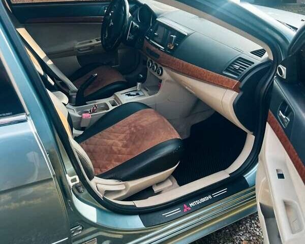 Сірий Міцубісі Lancer, об'ємом двигуна 2 л та пробігом 212 тис. км за 7300 $, фото 2 на Automoto.ua