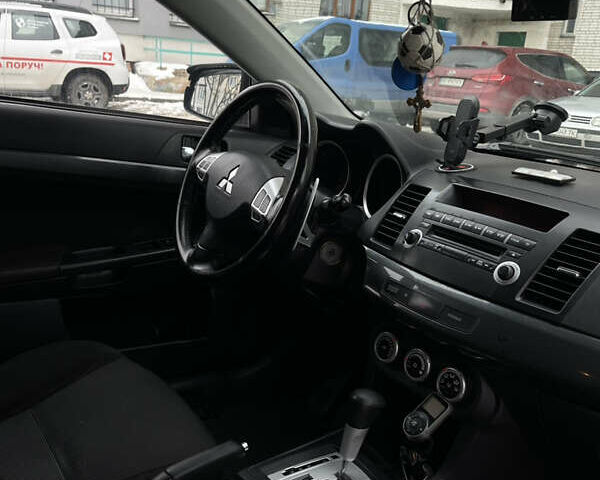 Сірий Міцубісі Lancer, об'ємом двигуна 2 л та пробігом 234 тис. км за 7200 $, фото 16 на Automoto.ua