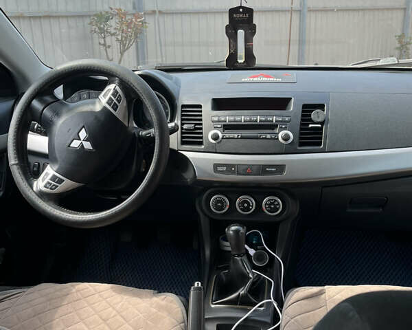 Сірий Міцубісі Lancer, об'ємом двигуна 1.8 л та пробігом 207 тис. км за 5800 $, фото 6 на Automoto.ua