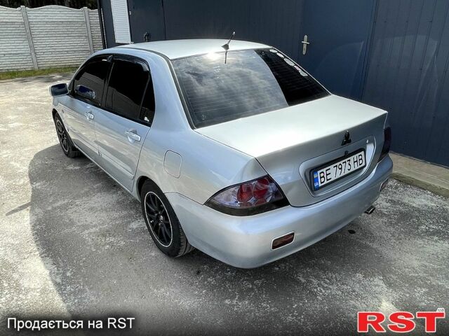 Сірий Міцубісі Lancer, об'ємом двигуна 1.6 л та пробігом 193 тис. км за 4500 $, фото 6 на Automoto.ua
