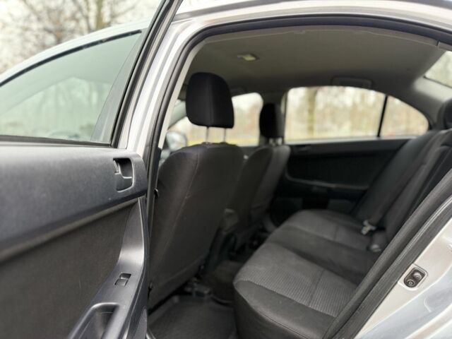 Сірий Міцубісі Lancer, об'ємом двигуна 2 л та пробігом 265 тис. км за 5300 $, фото 14 на Automoto.ua