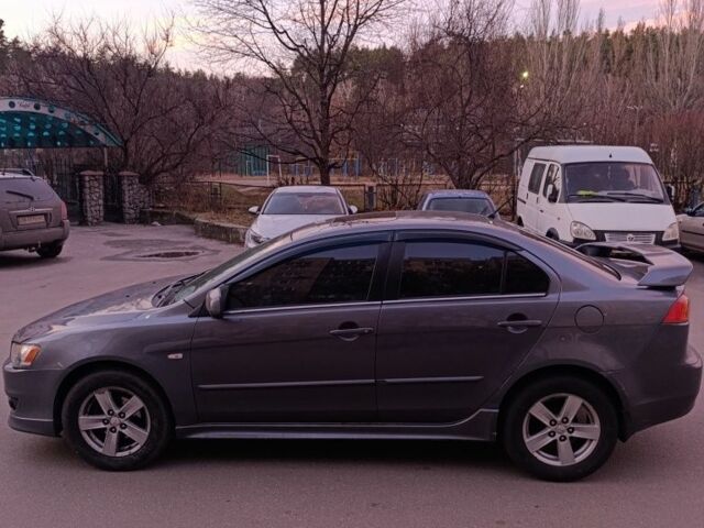 Серый Мицубиси Лансер, объемом двигателя 2 л и пробегом 345 тыс. км за 6500 $, фото 2 на Automoto.ua