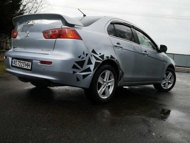 Серый Мицубиси Лансер, объемом двигателя 2 л и пробегом 260 тыс. км за 5200 $, фото 5 на Automoto.ua