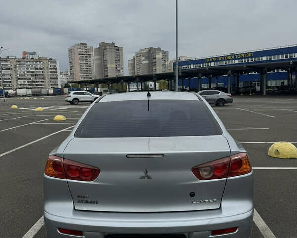 Сірий Міцубісі Lancer, об'ємом двигуна 2 л та пробігом 185 тис. км за 7000 $, фото 3 на Automoto.ua