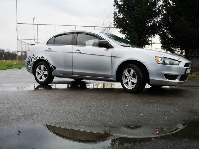 Серый Мицубиси Лансер, объемом двигателя 2 л и пробегом 260 тыс. км за 5200 $, фото 3 на Automoto.ua