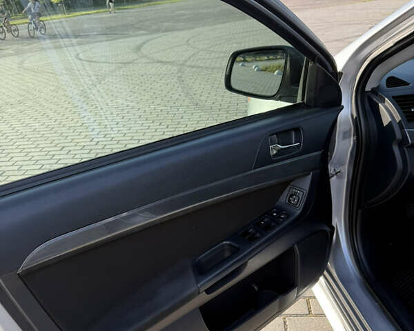 Сірий Міцубісі Lancer, об'ємом двигуна 2 л та пробігом 250 тис. км за 5999 $, фото 14 на Automoto.ua
