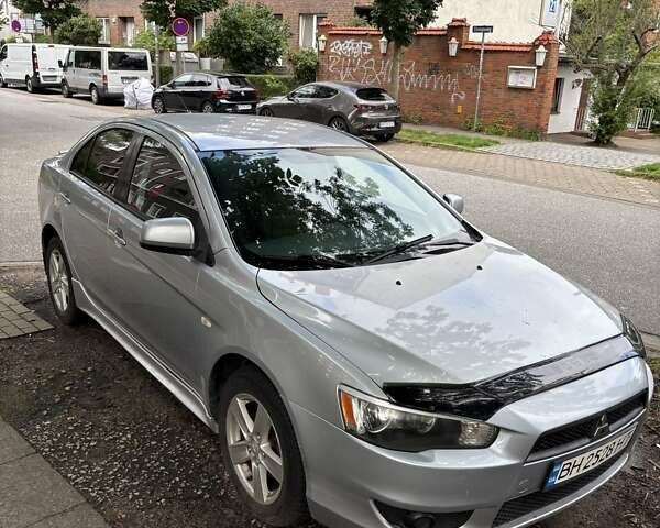 Серый Мицубиси Лансер, объемом двигателя 2 л и пробегом 183 тыс. км за 7500 $, фото 1 на Automoto.ua