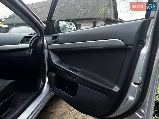 Серый Мицубиси Лансер, объемом двигателя 1.5 л и пробегом 147 тыс. км за 6700 $, фото 14 на Automoto.ua