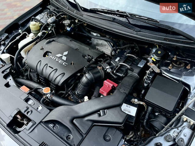 Серый Мицубиси Лансер, объемом двигателя 2 л и пробегом 212 тыс. км за 6000 $, фото 29 на Automoto.ua