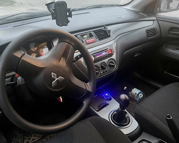 Сірий Міцубісі Lancer, об'ємом двигуна 1.58 л та пробігом 186 тис. км за 3500 $, фото 5 на Automoto.ua