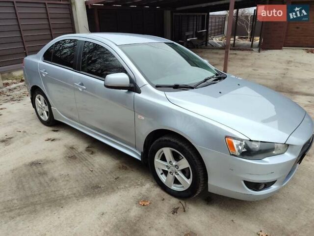 Серый Мицубиси Лансер, объемом двигателя 2 л и пробегом 234 тыс. км за 7200 $, фото 2 на Automoto.ua