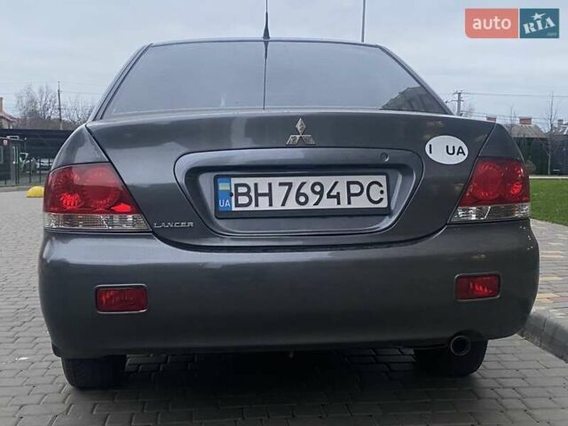 Сірий Міцубісі Lancer, об'ємом двигуна 1.6 л та пробігом 250 тис. км за 3500 $, фото 5 на Automoto.ua