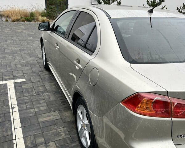 Сірий Міцубісі Lancer, об'ємом двигуна 2 л та пробігом 230 тис. км за 6800 $, фото 13 на Automoto.ua
