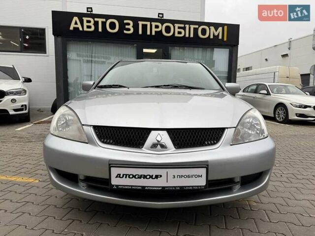 Сірий Міцубісі Lancer, об'ємом двигуна 1.6 л та пробігом 206 тис. км за 4799 $, фото 6 на Automoto.ua