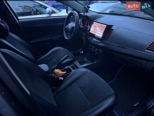 Сірий Міцубісі Lancer, об'ємом двигуна 1.5 л та пробігом 200 тис. км за 6400 $, фото 9 на Automoto.ua