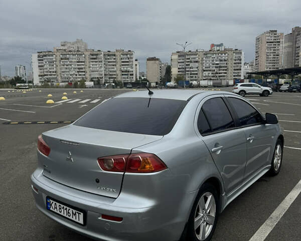 Сірий Міцубісі Lancer, об'ємом двигуна 2 л та пробігом 185 тис. км за 7000 $, фото 4 на Automoto.ua