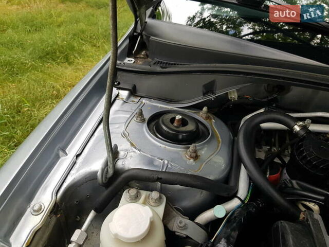Серый Мицубиси Лансер, объемом двигателя 2 л и пробегом 150 тыс. км за 5650 $, фото 27 на Automoto.ua