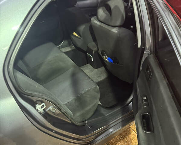 Серый Мицубиси Лансер, объемом двигателя 1.6 л и пробегом 268 тыс. км за 4600 $, фото 7 на Automoto.ua