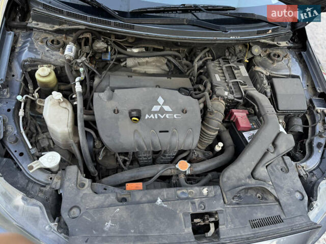 Сірий Міцубісі Lancer, об'ємом двигуна 2 л та пробігом 292 тис. км за 5500 $, фото 7 на Automoto.ua