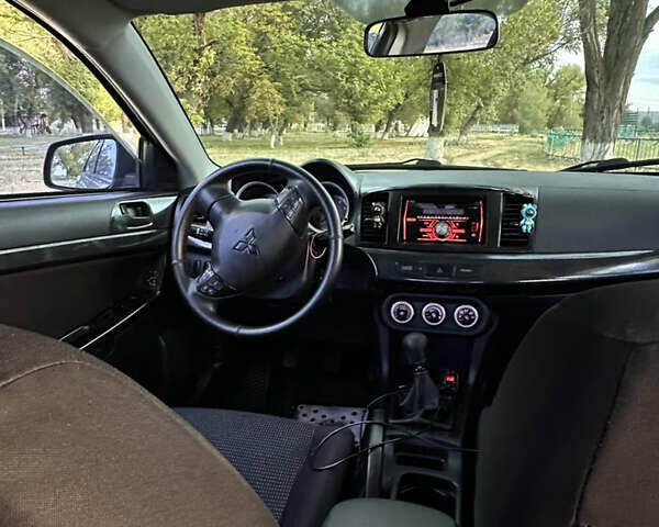 Серый Мицубиси Лансер, объемом двигателя 1.5 л и пробегом 255 тыс. км за 6000 $, фото 12 на Automoto.ua