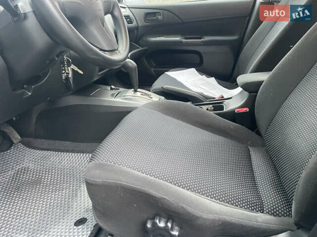 Сірий Міцубісі Lancer, об'ємом двигуна 1.58 л та пробігом 220 тис. км за 5900 $, фото 17 на Automoto.ua