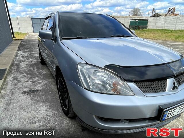 Сірий Міцубісі Lancer, об'ємом двигуна 1.6 л та пробігом 193 тис. км за 4500 $, фото 3 на Automoto.ua