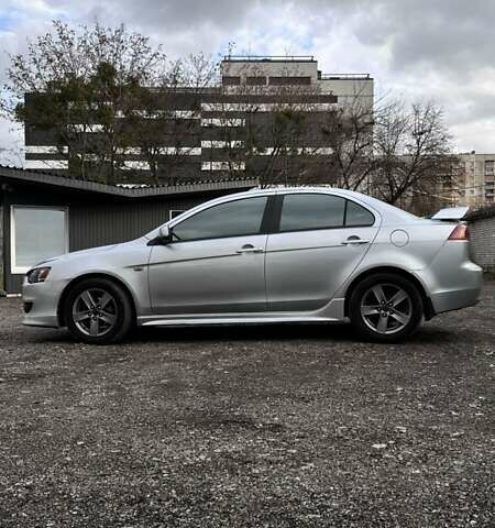 Сірий Міцубісі Lancer, об'ємом двигуна 2 л та пробігом 210 тис. км за 7100 $, фото 5 на Automoto.ua