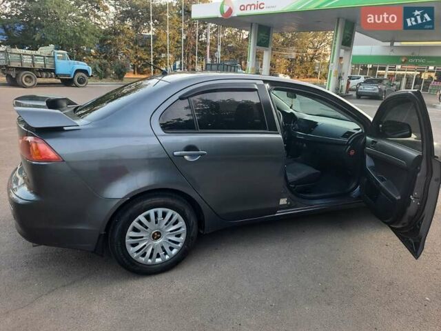 Сірий Міцубісі Lancer, об'ємом двигуна 1.5 л та пробігом 202 тис. км за 5899 $, фото 2 на Automoto.ua