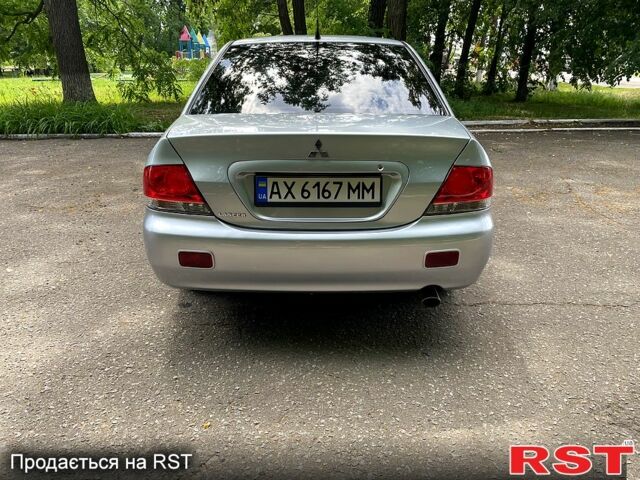 Сірий Міцубісі Lancer, об'ємом двигуна 1.6 л та пробігом 204 тис. км за 4500 $, фото 5 на Automoto.ua