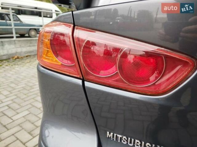 Міцубісі Lancer 2008 у Хмельницькому на Automoto.ua Сірий Міцубісі Lancer, об'ємом двигуна 2 л та пробігом 157 тис. км за 6300 $, фото 31 на Automoto.ua