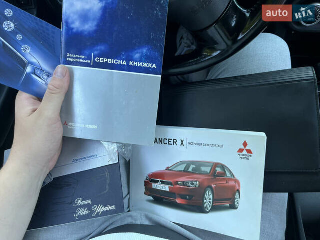 Сірий Міцубісі Lancer, об'ємом двигуна 2 л та пробігом 237 тис. км за 7200 $, фото 44 на Automoto.ua