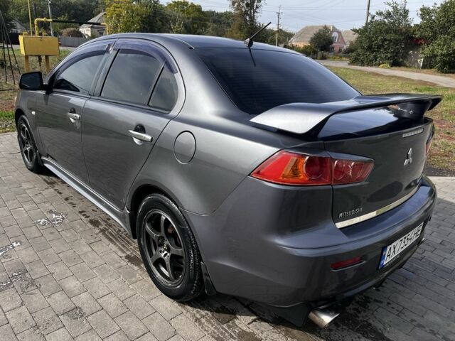Серый Мицубиси Лансер, объемом двигателя 2 л и пробегом 224 тыс. км за 6500 $, фото 2 на Automoto.ua