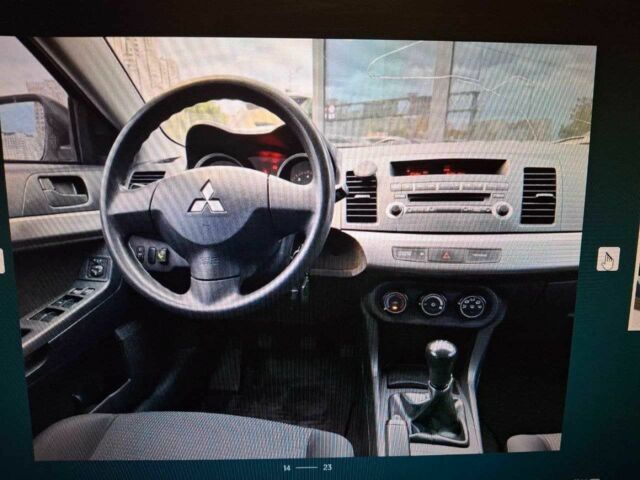 Серый Мицубиси Лансер, объемом двигателя 1.5 л и пробегом 235 тыс. км за 6500 $, фото 9 на Automoto.ua