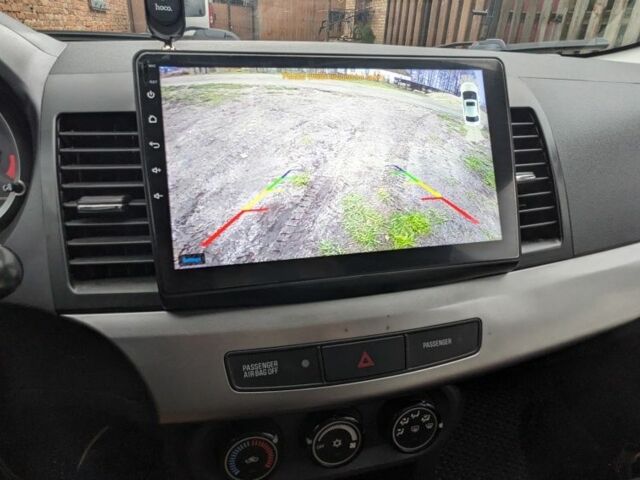 Серый Мицубиси Лансер, объемом двигателя 1.5 л и пробегом 147 тыс. км за 6700 $, фото 17 на Automoto.ua