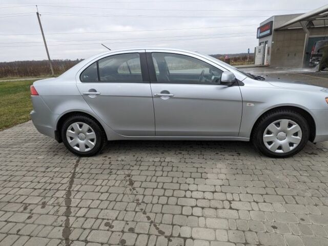 Серый Мицубиси Лансер, объемом двигателя 1.5 л и пробегом 147 тыс. км за 6700 $, фото 6 на Automoto.ua