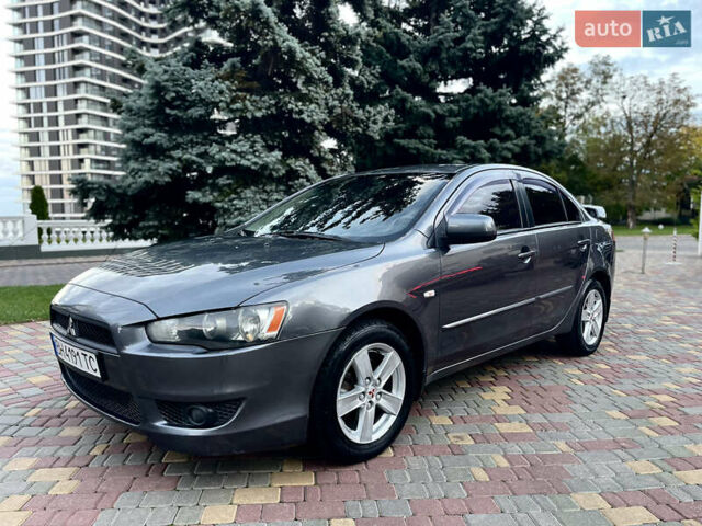 Серый Мицубиси Лансер, объемом двигателя 2 л и пробегом 212 тыс. км за 6000 $, фото 2 на Automoto.ua