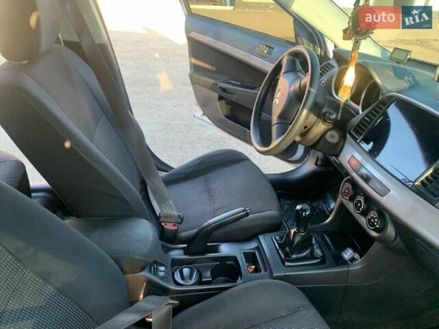 Серый Мицубиси Лансер, объемом двигателя 1.5 л и пробегом 160 тыс. км за 5300 $, фото 2 на Automoto.ua