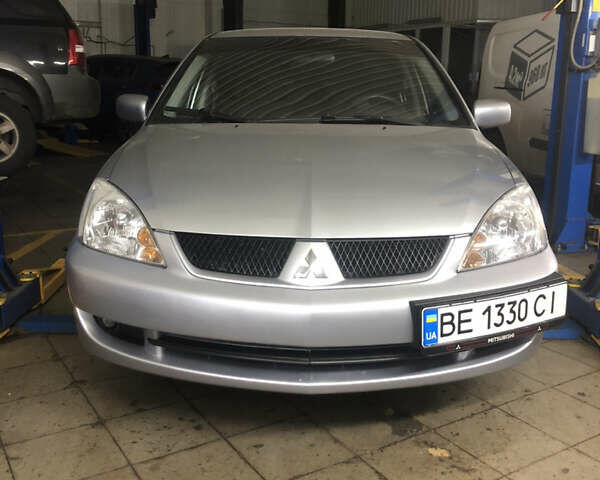 Сірий Міцубісі Lancer, об'ємом двигуна 1.6 л та пробігом 112 тис. км за 7000 $, фото 2 на Automoto.ua