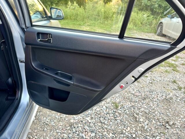 Сірий Міцубісі Lancer, об'ємом двигуна 2 л та пробігом 223 тис. км за 6890 $, фото 16 на Automoto.ua