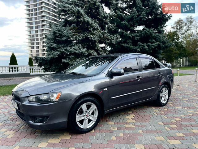 Серый Мицубиси Лансер, объемом двигателя 2 л и пробегом 212 тыс. км за 6000 $, фото 3 на Automoto.ua