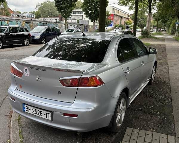 Серый Мицубиси Лансер, объемом двигателя 2 л и пробегом 183 тыс. км за 7500 $, фото 2 на Automoto.ua