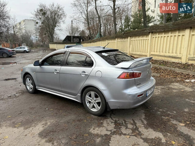 Серый Мицубиси Лансер, объемом двигателя 2 л и пробегом 265 тыс. км за 5200 $, фото 2 на Automoto.ua