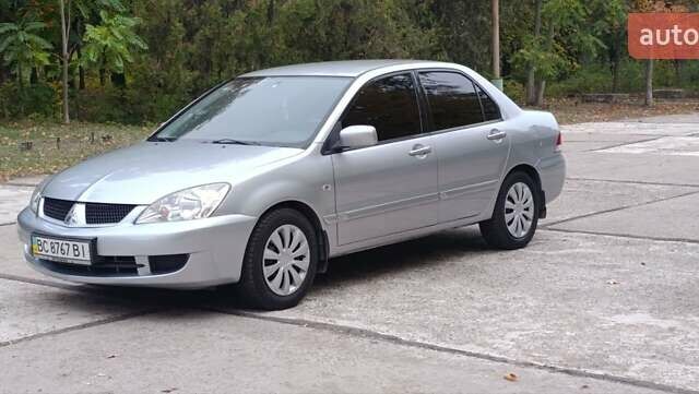 Сірий Міцубісі Lancer, об'ємом двигуна 1.6 л та пробігом 176 тис. км за 4999 $, фото 8 на Automoto.ua