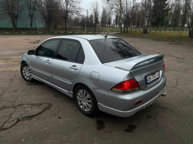 Сірий Міцубісі Lancer, об'ємом двигуна 1.6 л та пробігом 254 тис. км за 3800 $, фото 6 на Automoto.ua