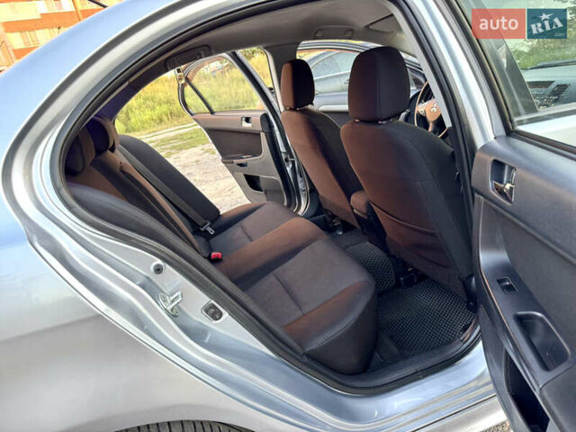 Сірий Міцубісі Lancer, об'ємом двигуна 2 л та пробігом 223 тис. км за 7390 $, фото 15 на Automoto.ua