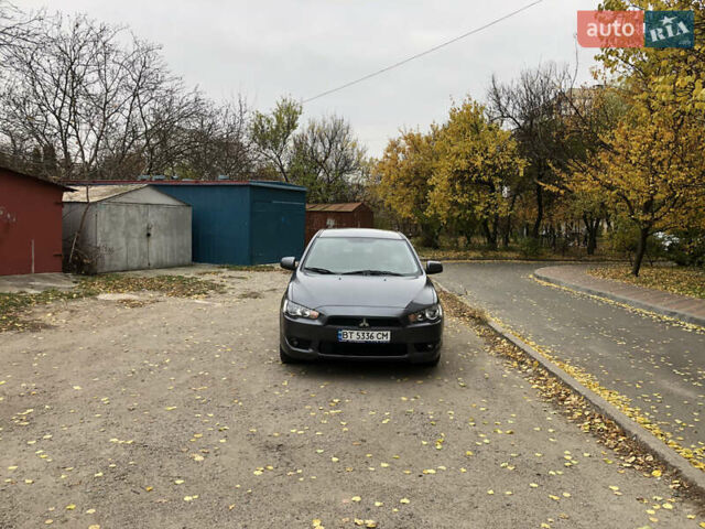 Сірий Міцубісі Lancer, об'ємом двигуна 2 л та пробігом 187 тис. км за 8000 $, фото 11 на Automoto.ua