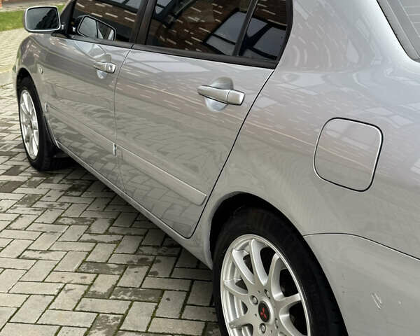 Сірий Міцубісі Lancer, об'ємом двигуна 1.6 л та пробігом 269 тис. км за 3999 $, фото 14 на Automoto.ua