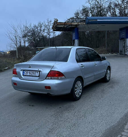 Сірий Міцубісі Lancer, об'ємом двигуна 1.58 л та пробігом 180 тис. км за 3900 $, фото 3 на Automoto.ua